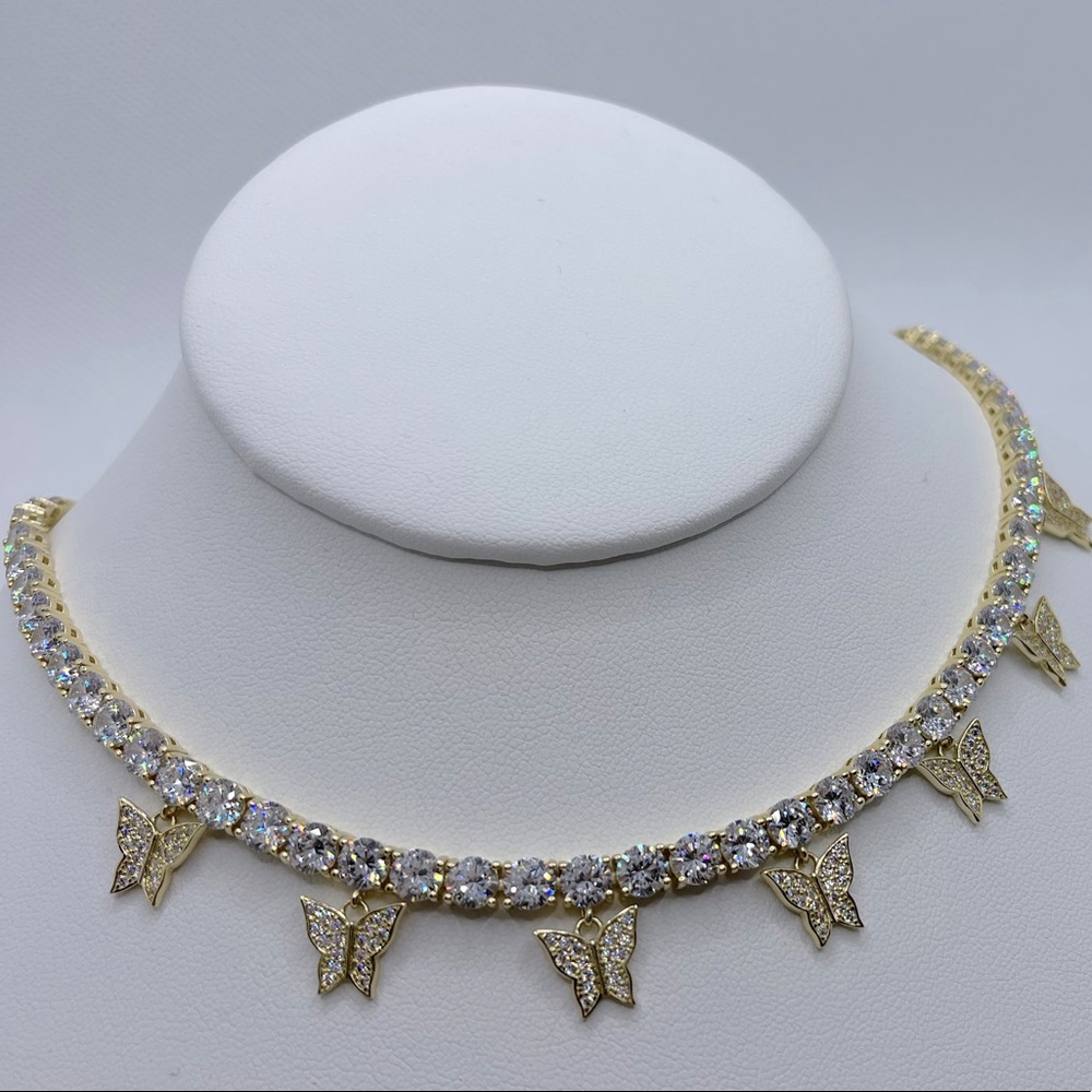 Beautiful tennis necklace with hanging butterflies